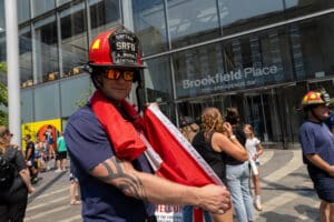 Steve Maruk showing the Canadian flag he took with him on his stairclimb. Steve Maruk showing the Canadian flag he took with him on his stairclimb.