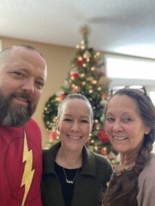 Jenn with husband and mom