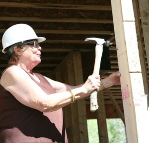 Pat helping to build Carma House.